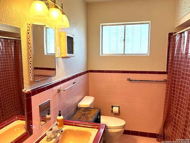 a room with cabinets and window