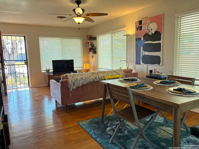 a kitchen with stainless steel appliances granite countertop a refrigerator and a stove