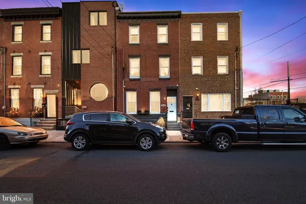 a car parked in front of a building