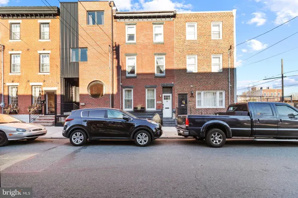 a car parked in front of a house