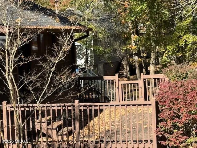 a view of houses with a yard