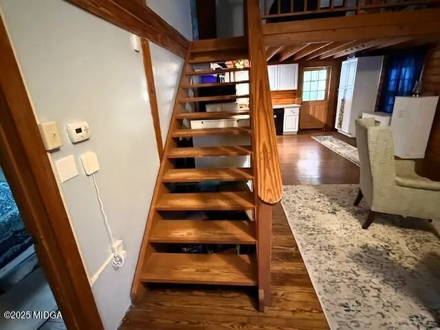 a view of entryway with a front door