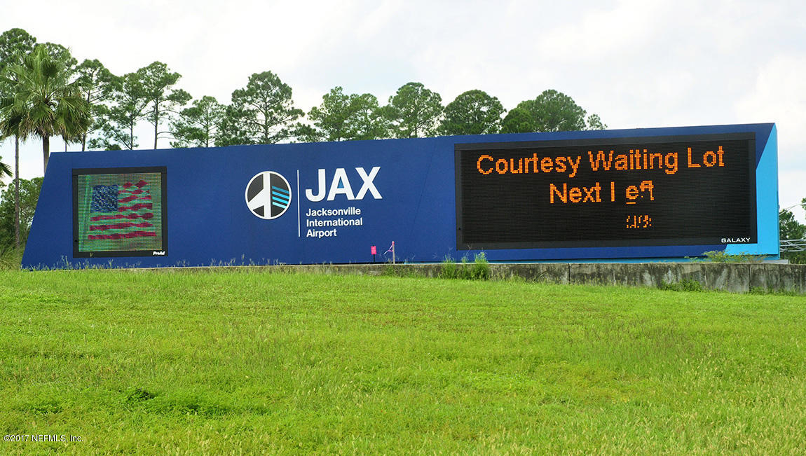 348 Harley Drive Jacksonville, FL 32218 - Photo 3 of 6 a sign of golf club on a wall