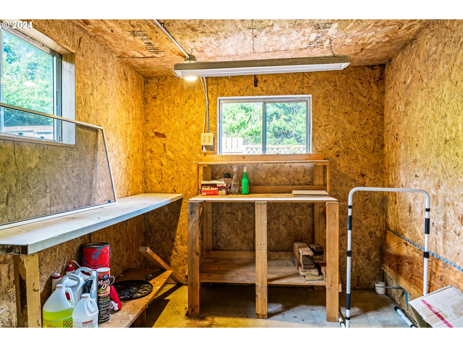 1600 Rhododendron Drive, Unit 406 Florence, OR 97439 - Photo 28 of 42 a balcony with table and chairs