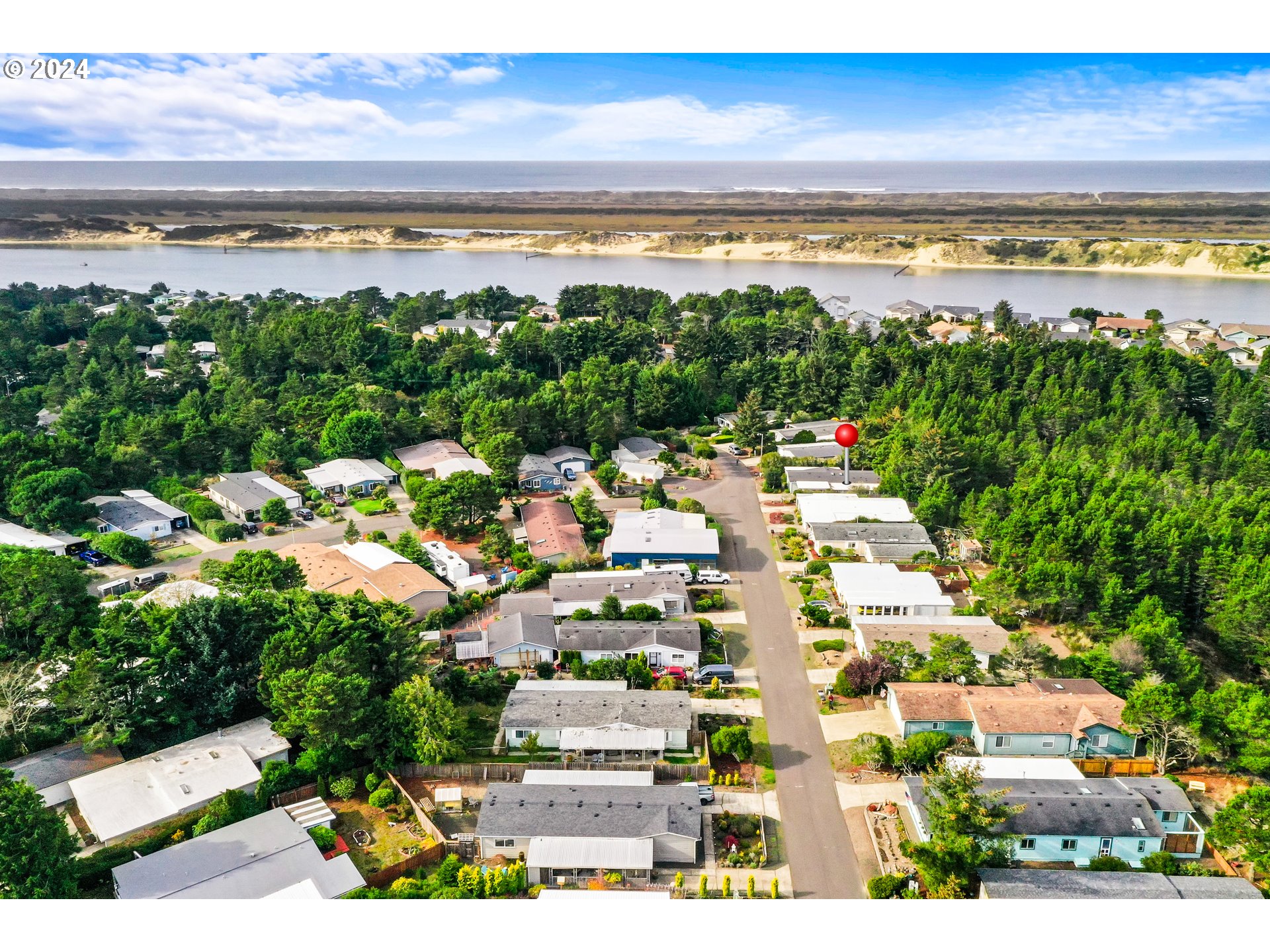 1600 Rhododendron Drive, Unit 406 Florence, OR 97439 - Photo 34 of 42 a view of an ocean and beach