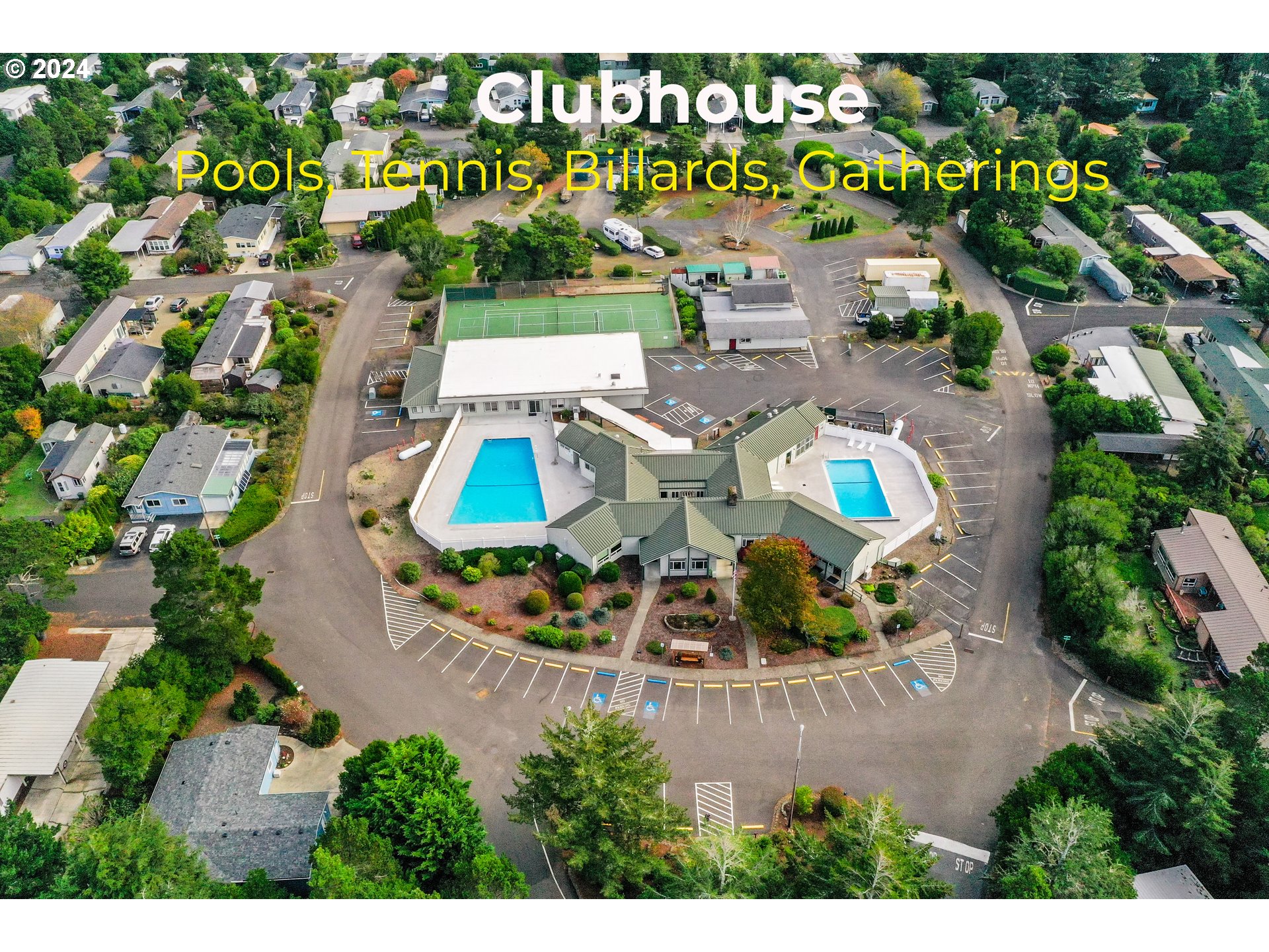 1600 Rhododendron Drive, Unit 406 Florence, OR 97439 - Photo 40 of 42 an aerial view of a house with a garden