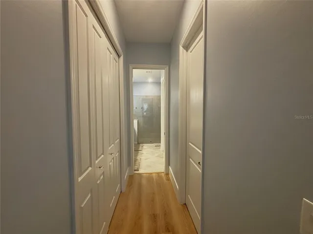 a bathroom with a sink double vanity and a mirror
