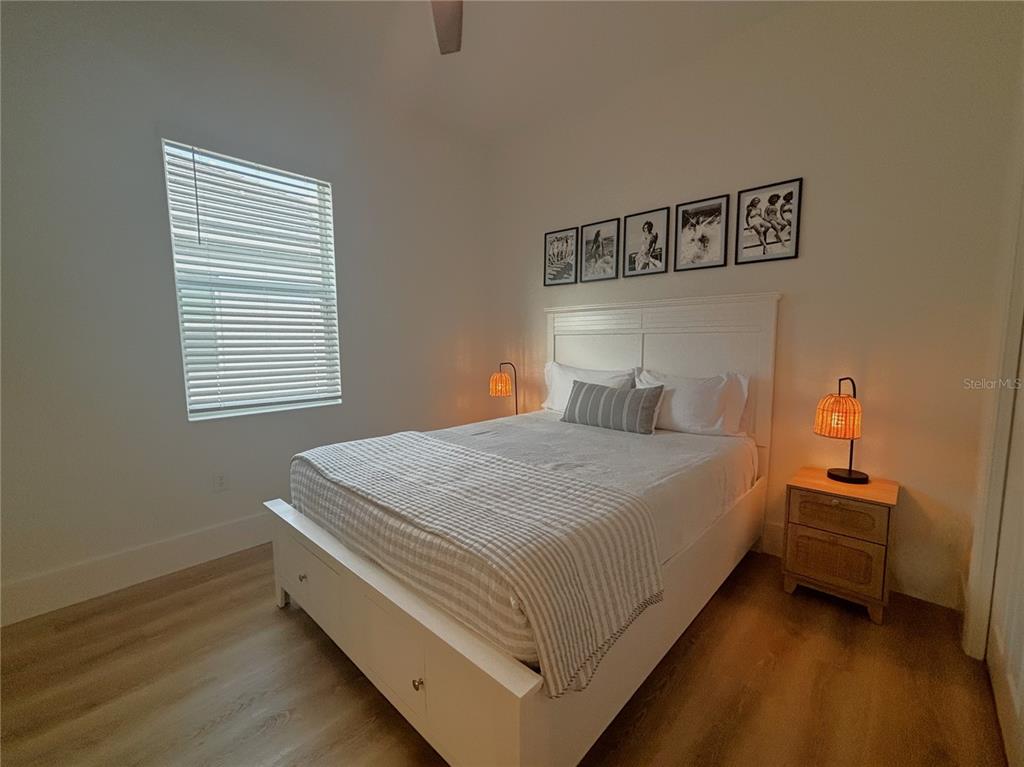 17435 Jadestone Court Venice, FL 34293 - Photo 15 of 68 a bedroom with bed and a window