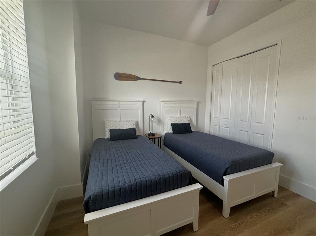 17435 Jadestone Court Venice, FL 34293 - Photo 20 of 68 a bedroom with a bed and a window