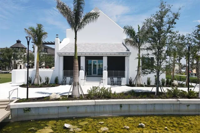 a view of a swimming pool with a patio