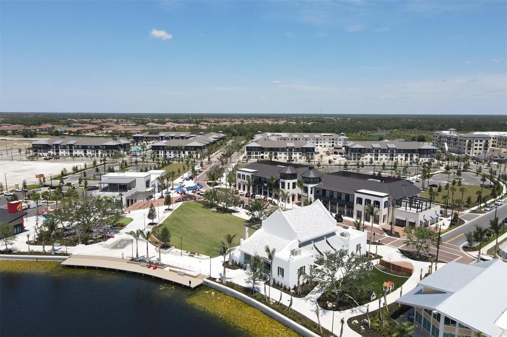 17435 Jadestone Court Venice, FL 34293 - Photo 44 of 68 an aerial view of residential houses with outdoor space