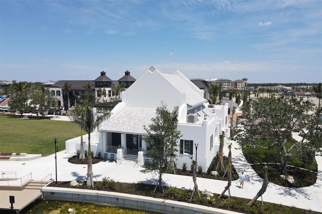 17435 Jadestone Court Venice, FL 34293 - Photo 54 of 68 a front view of a house with lake view