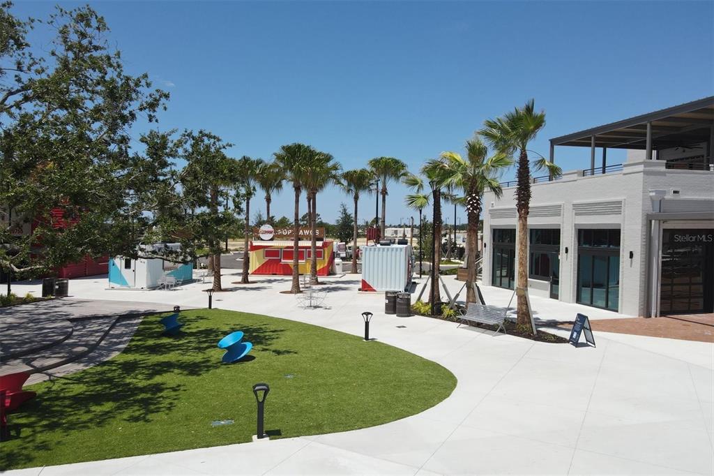 17435 Jadestone Court Venice, FL 34293 - Photo 57 of 68 a view of a swimming pool with a patio