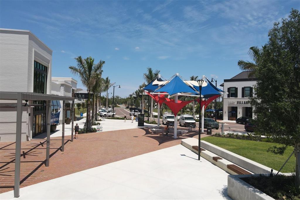 17435 Jadestone Court Venice, FL 34293 - Photo 59 of 68 a view of a building with sitting area