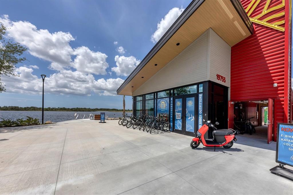 17435 Jadestone Court Venice, FL 34293 - Photo 66 of 68 a view of car parked in front of building