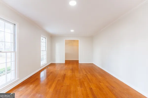 a view of an empty room and window