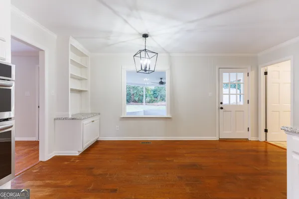 a big room with windows and closet