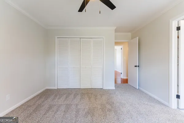 a view of an empty room and window