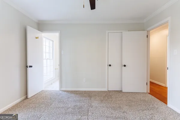 a view of an empty room and window