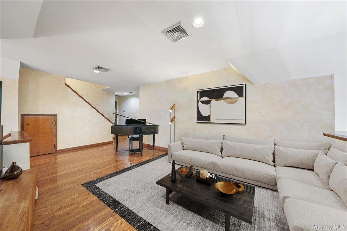 1 Lookout Road Tuxedo Park, NY 10987 - Photo 24 of 40 a living room with furniture and a wooden floor