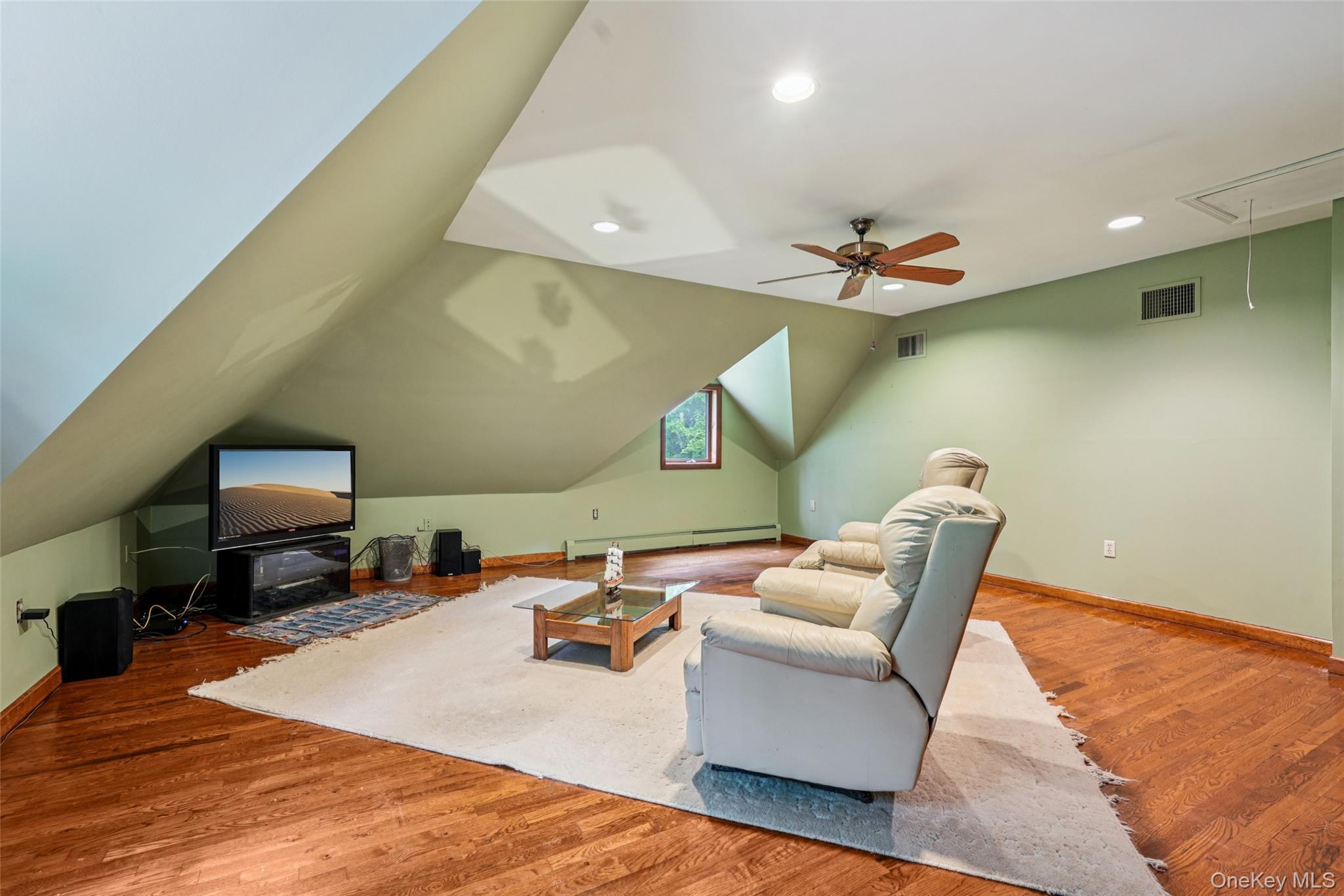 1 Lookout Road Tuxedo Park, NY 10987 - Photo 32 of 40 a living room with furniture and a wooden floor