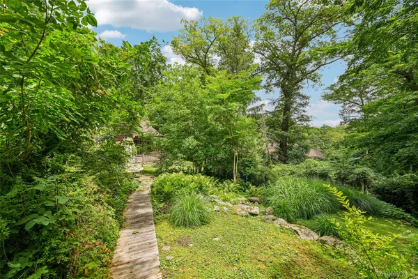 a view of a garden with a tree