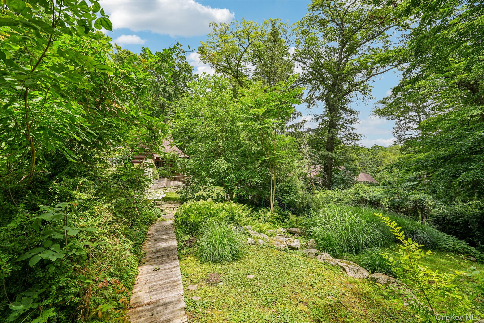 1 Lookout Road Tuxedo Park, NY 10987 - Photo 36 of 40 a view of a garden with a tree