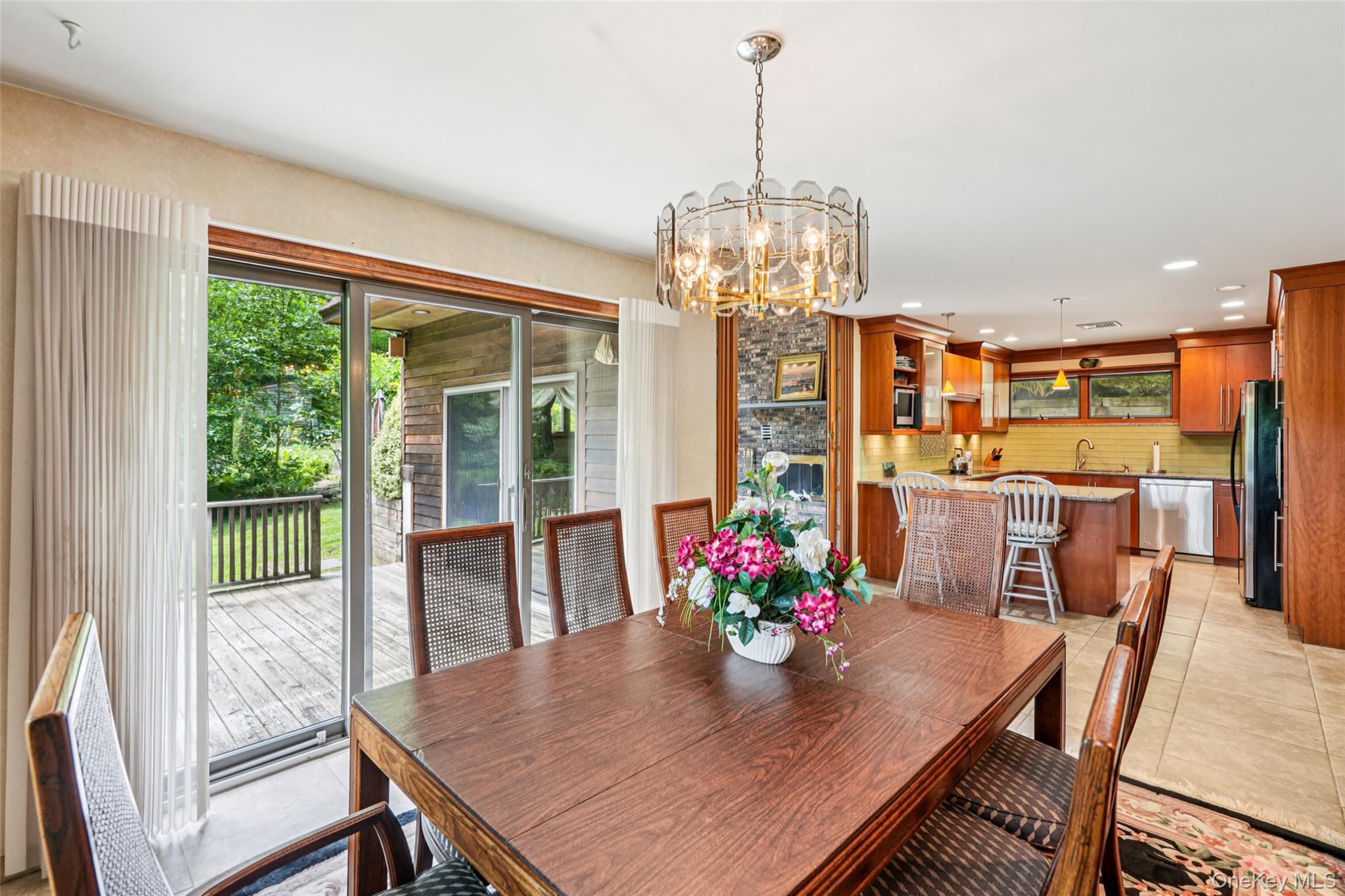 1 Lookout Road Tuxedo Park, NY 10987 - Photo 9 of 40 a view of a dining room with furniture window and outside view