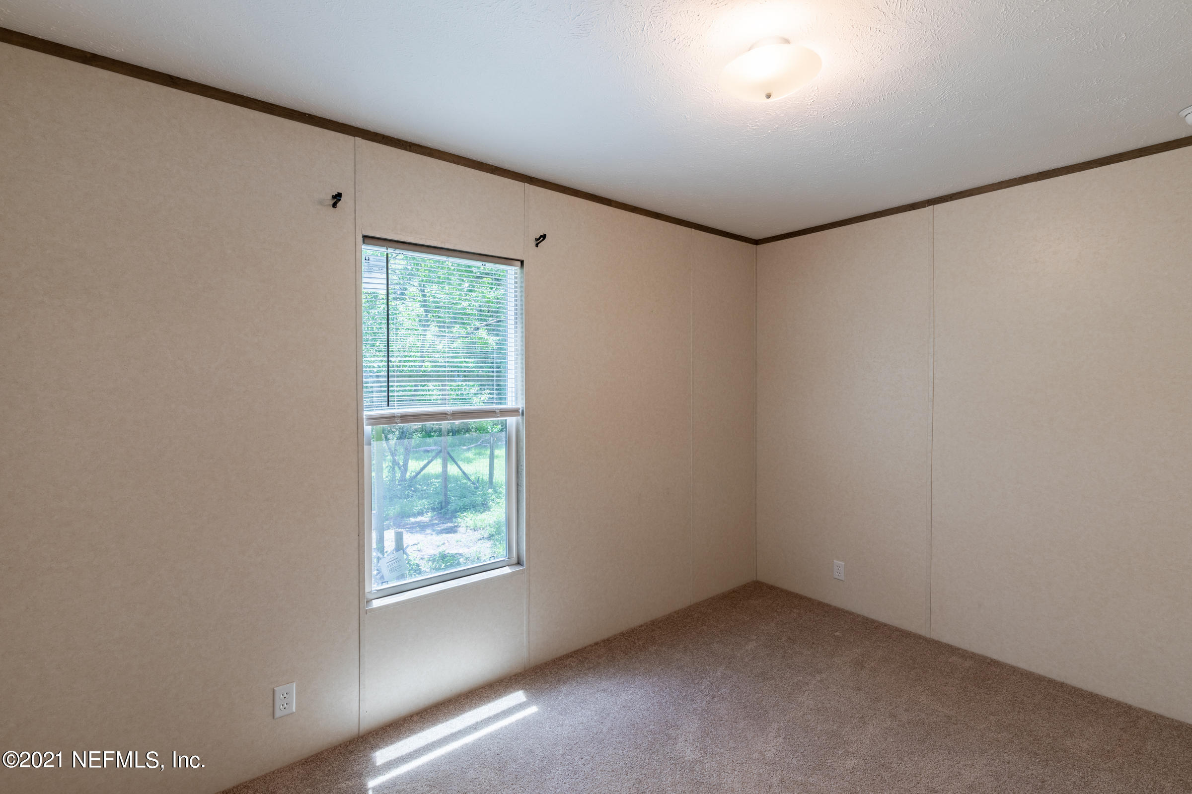5950 Trawick Road Keystone Heights, FL 32656 - Photo 7 of 15 Master Bedroom 1