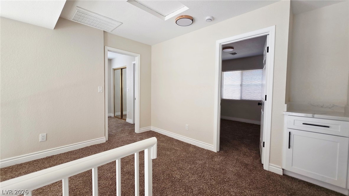 2155 Athol Way Laughlin, NV 89029 - Photo 13 of 19 A versatile upper-level landing, perfect for quiet contemplation or as a flexible transition space.