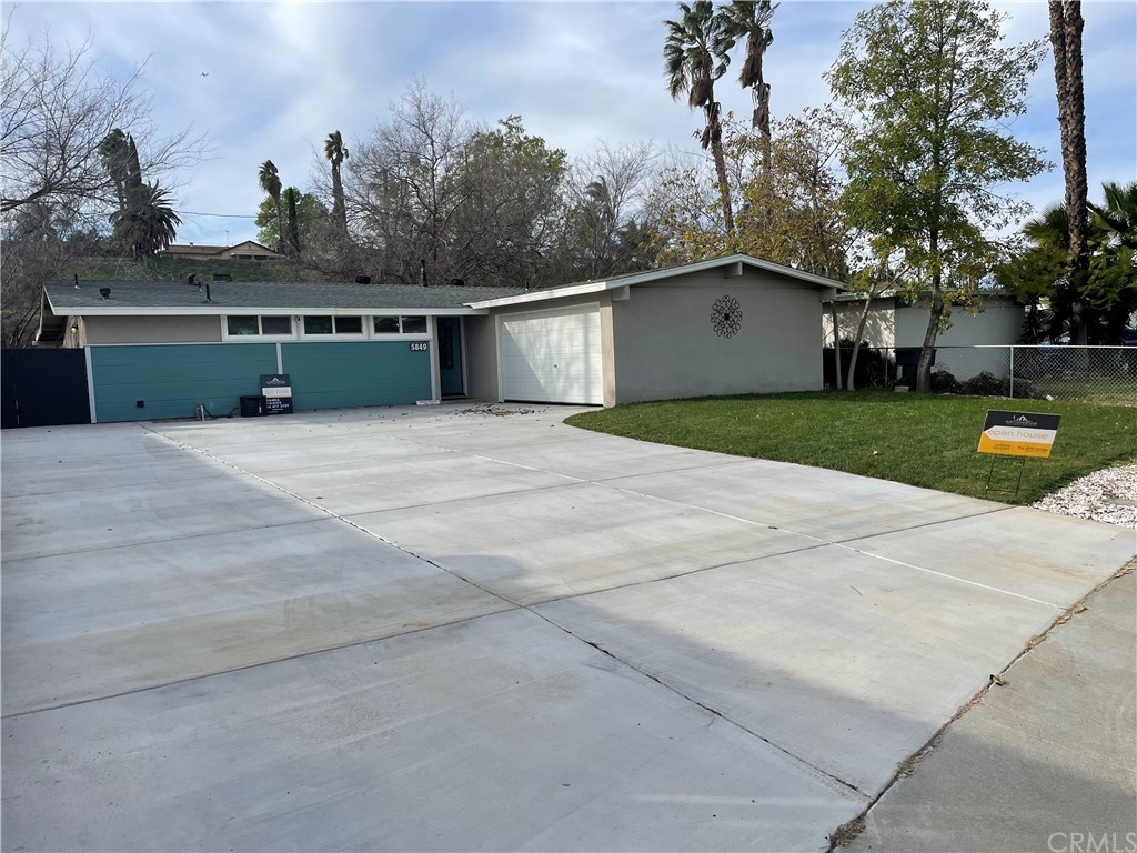 5849 Walter Street Riverside, CA 92504 - Photo 1 of 1 front view of house with a yard and trees