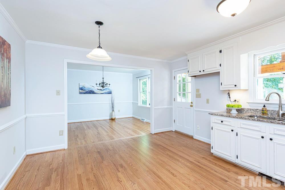 509 Compton Road Raleigh, NC 27609 - Photo 10 of 30 View looking out from the Kitchen into the Dining Room.