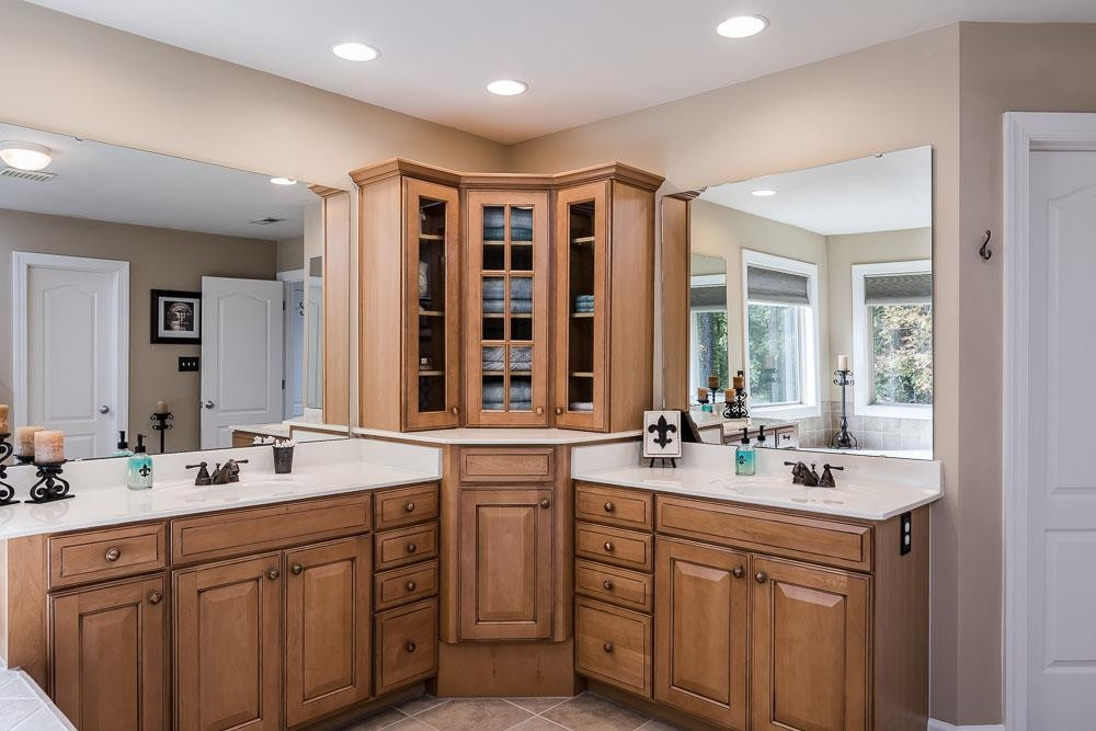 8236 Clarks Branch Drive Raleigh, NC 27613 - Photo 19 of 30 Along with this spacious bathroom are two separate closet spaces. The two large windows allow for natural light to flood this space, but have the privacy of the shades when needed. Master Bath/Spa