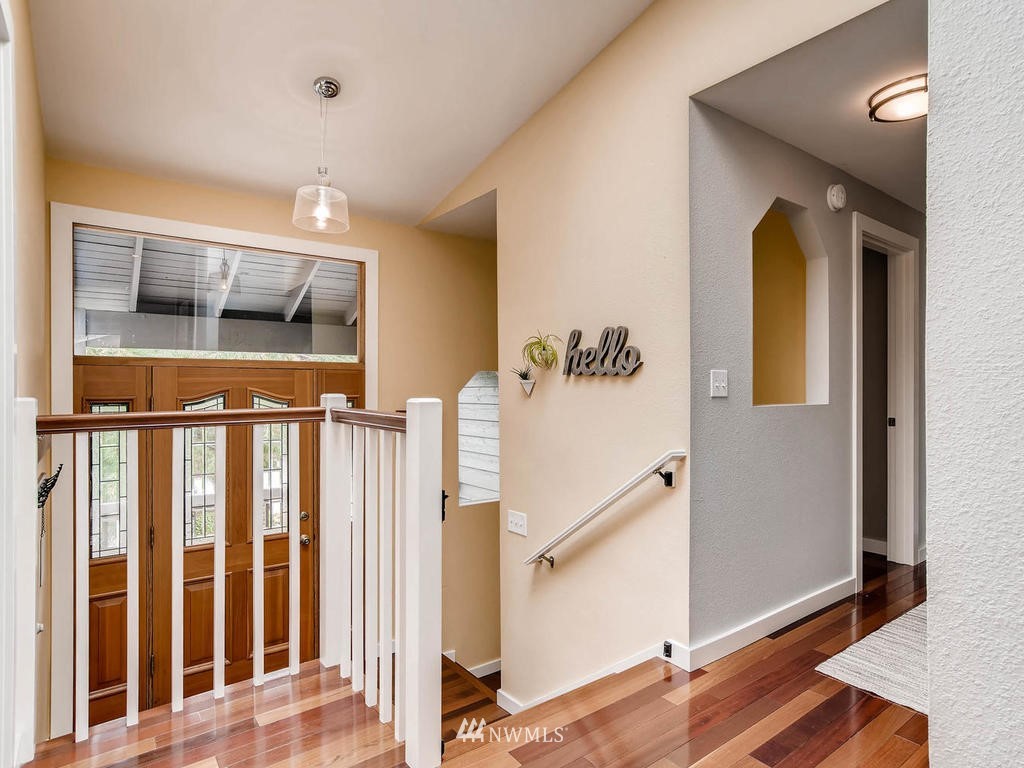 22108 1st Place West Bothell, WA 98021 - Photo 3 of 25 a view of an entryway with wooden floor