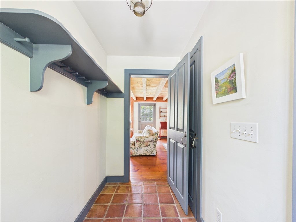 307 Stony Fort Road Saunderstown, RI 02874 - Photo 13 of 48 Coming in from the deck into a warm foyer