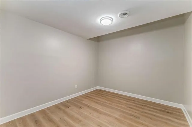 a view of a patio with a table and chairs