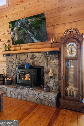 a view of a fireplace and a window in the house