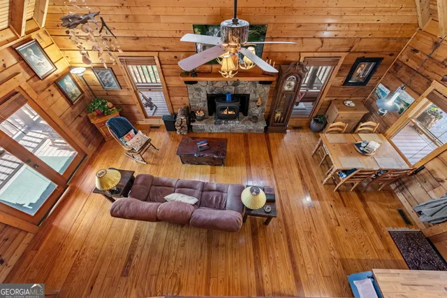 a view of a couches and dinning table in patio