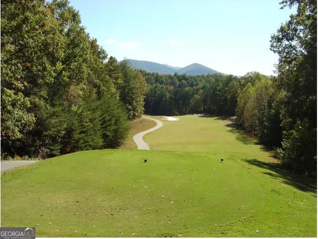 a sign on a brick wall