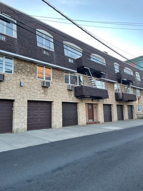 a large building with a parking space