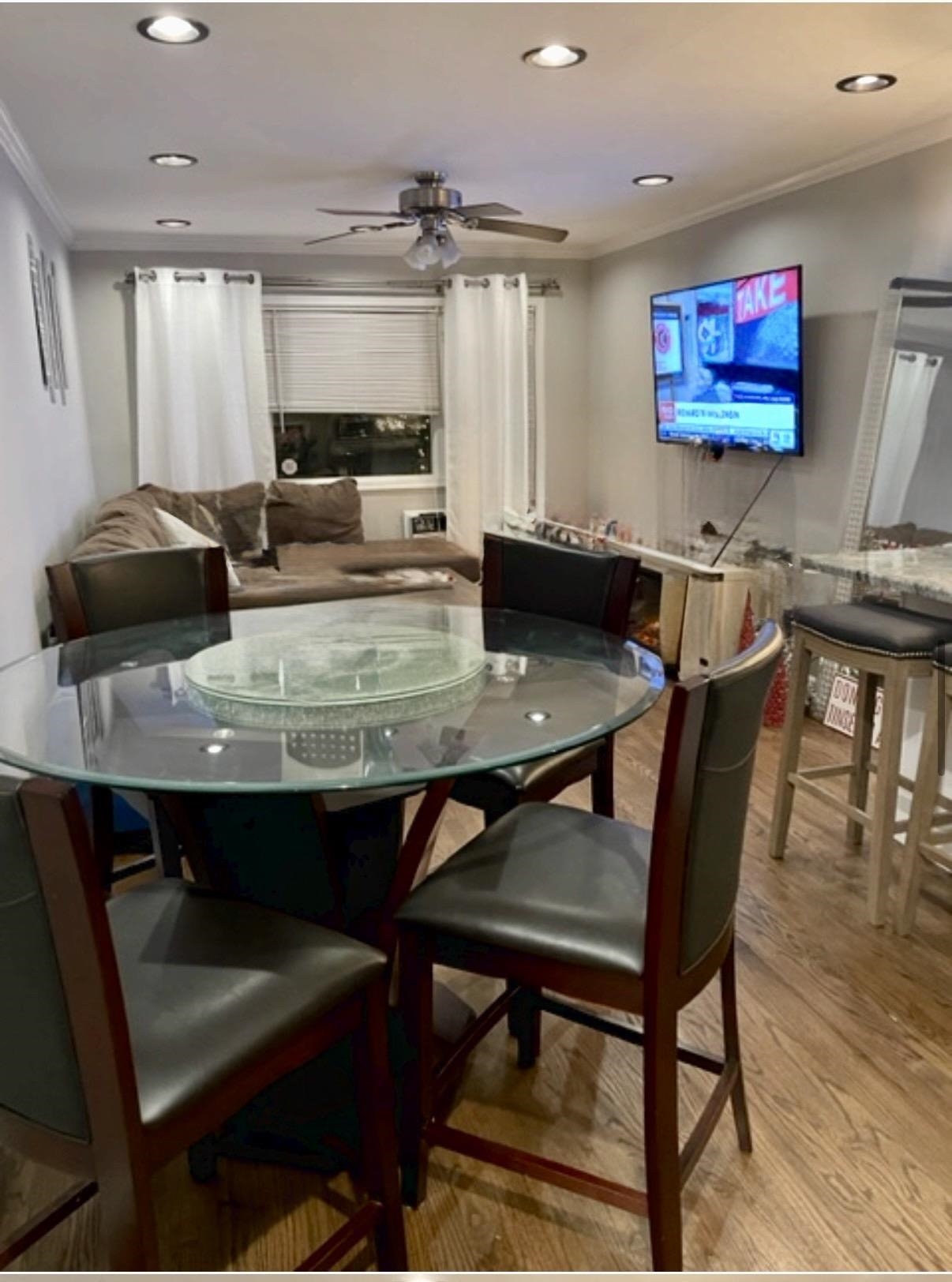 533 Madison Street, Unit 3A Hoboken, NJ 07030 - Photo 4 of 11 a view of a dining room with furniture