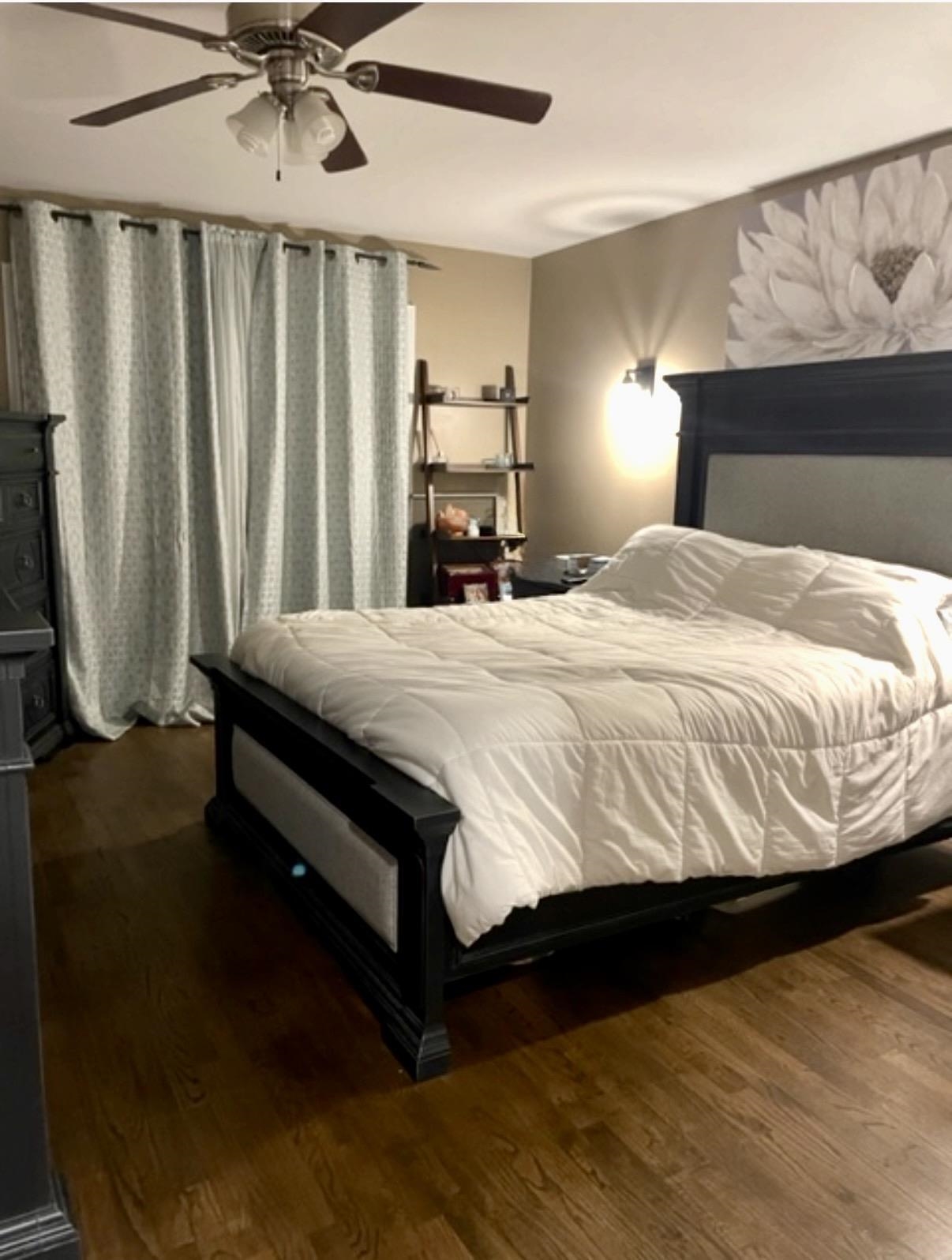 533 Madison Street, Unit 3A Hoboken, NJ 07030 - Photo 10 of 11 a bedroom with a bed mirror and window