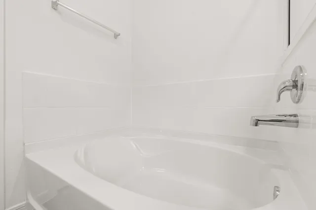 a close up of a bathtub