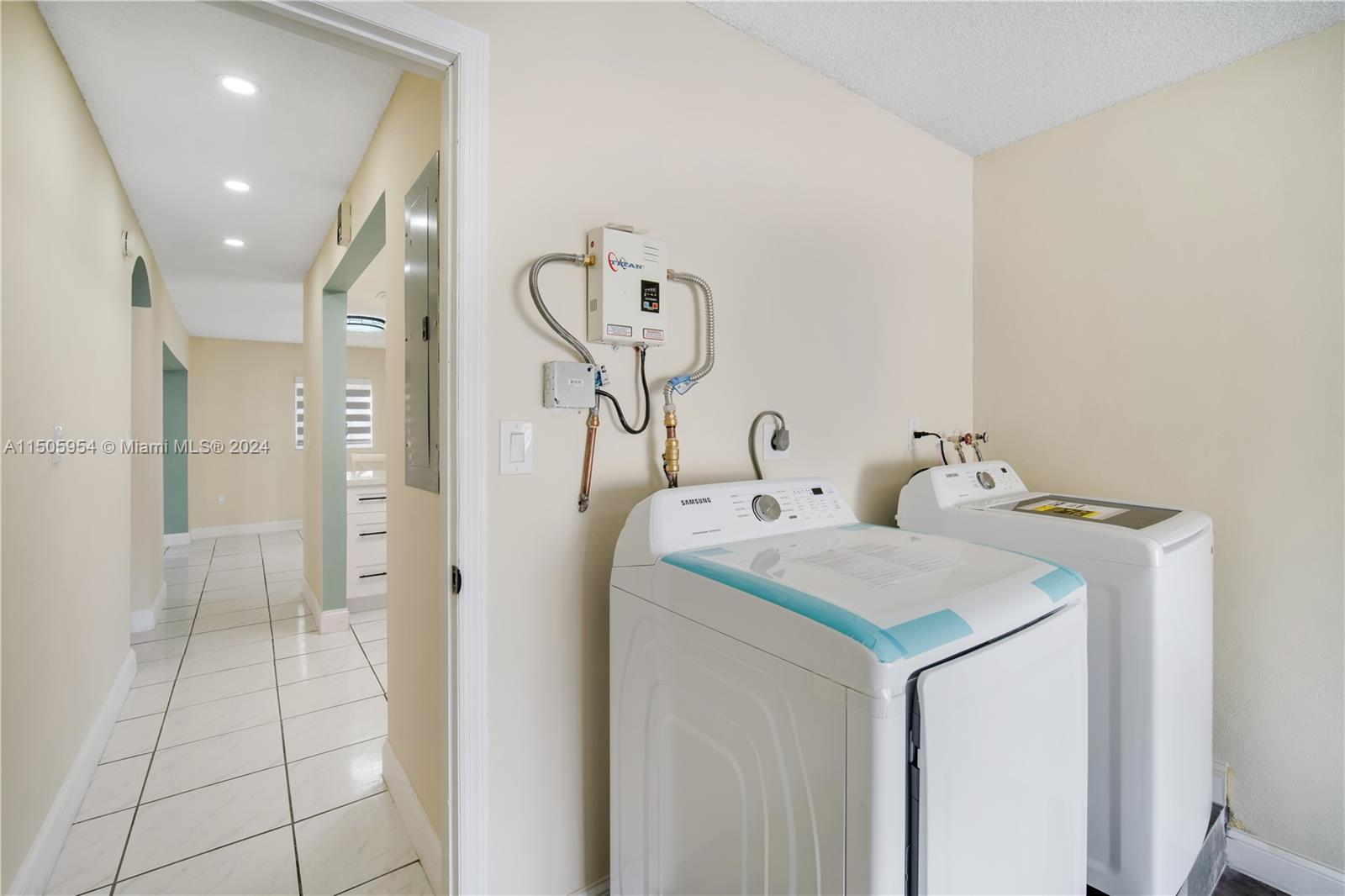 14364 Southwest 159th Terrace Miami, FL 33177 - Photo 12 of 32 a bathroom with a sink and a mirror