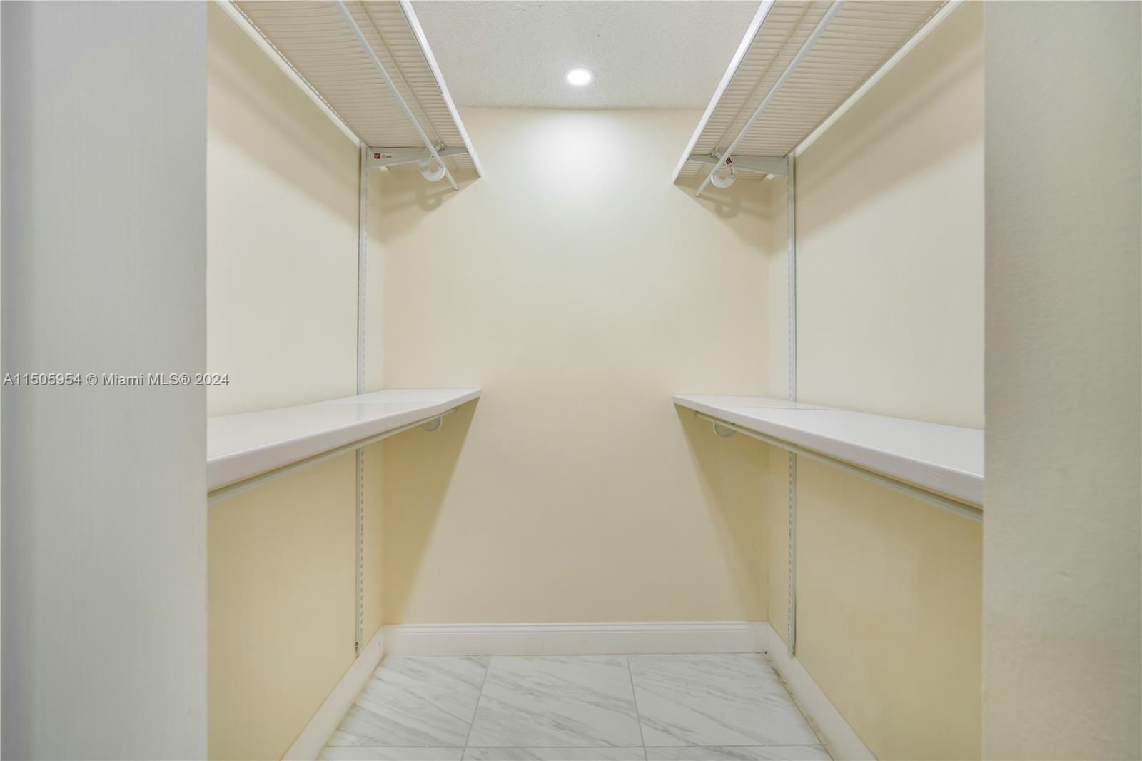 14364 Southwest 159th Terrace Miami, FL 33177 - Photo 23 of 32 a view of walk in closet