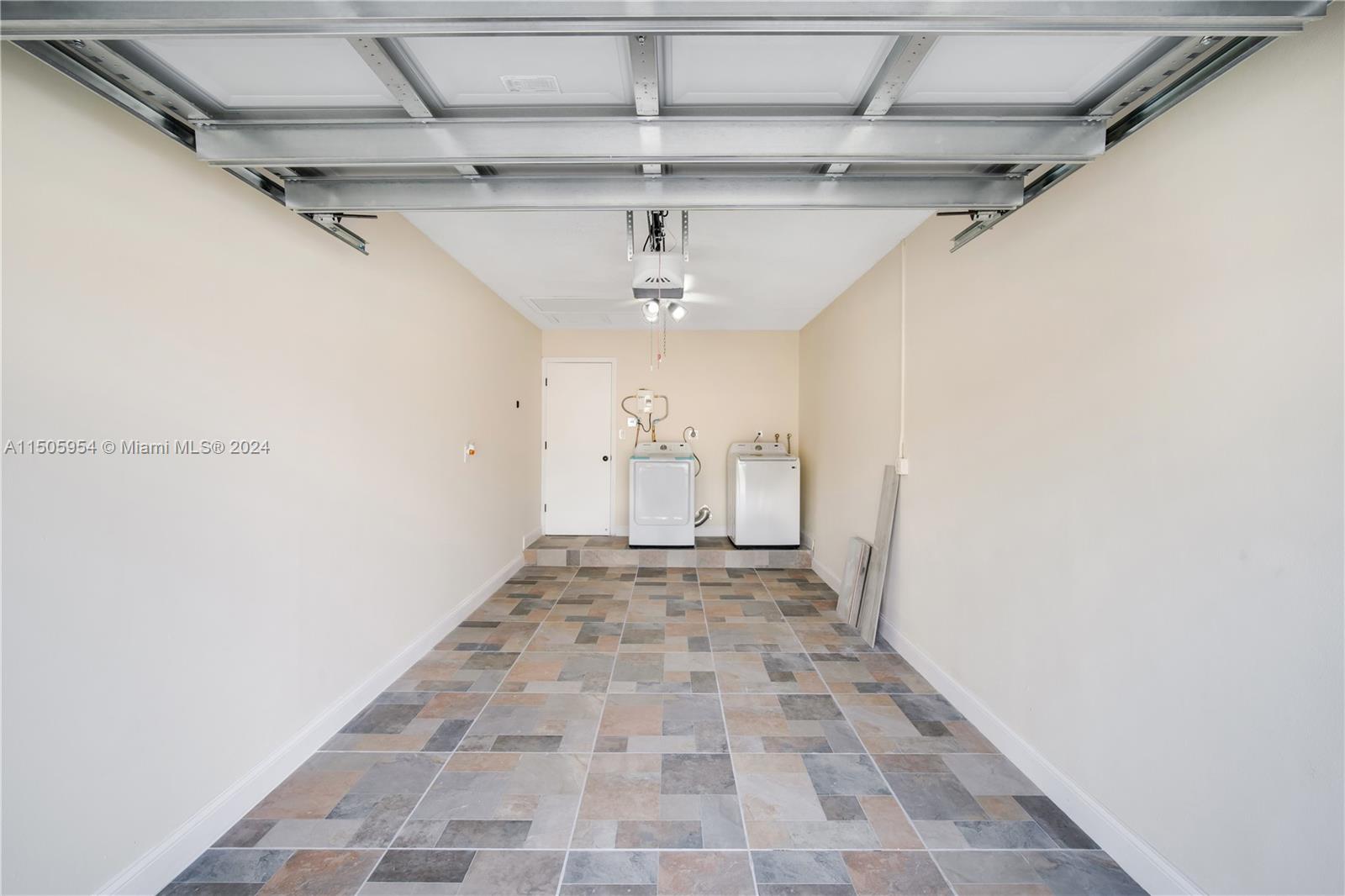 14364 Southwest 159th Terrace Miami, FL 33177 - Photo 30 of 32 a view of a hallway with a window
