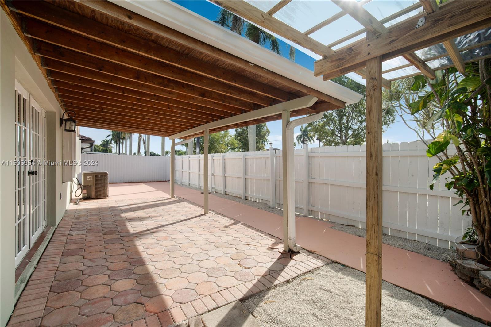 14364 Southwest 159th Terrace Miami, FL 33177 - Photo 31 of 32 a view of backyard with wooden fence