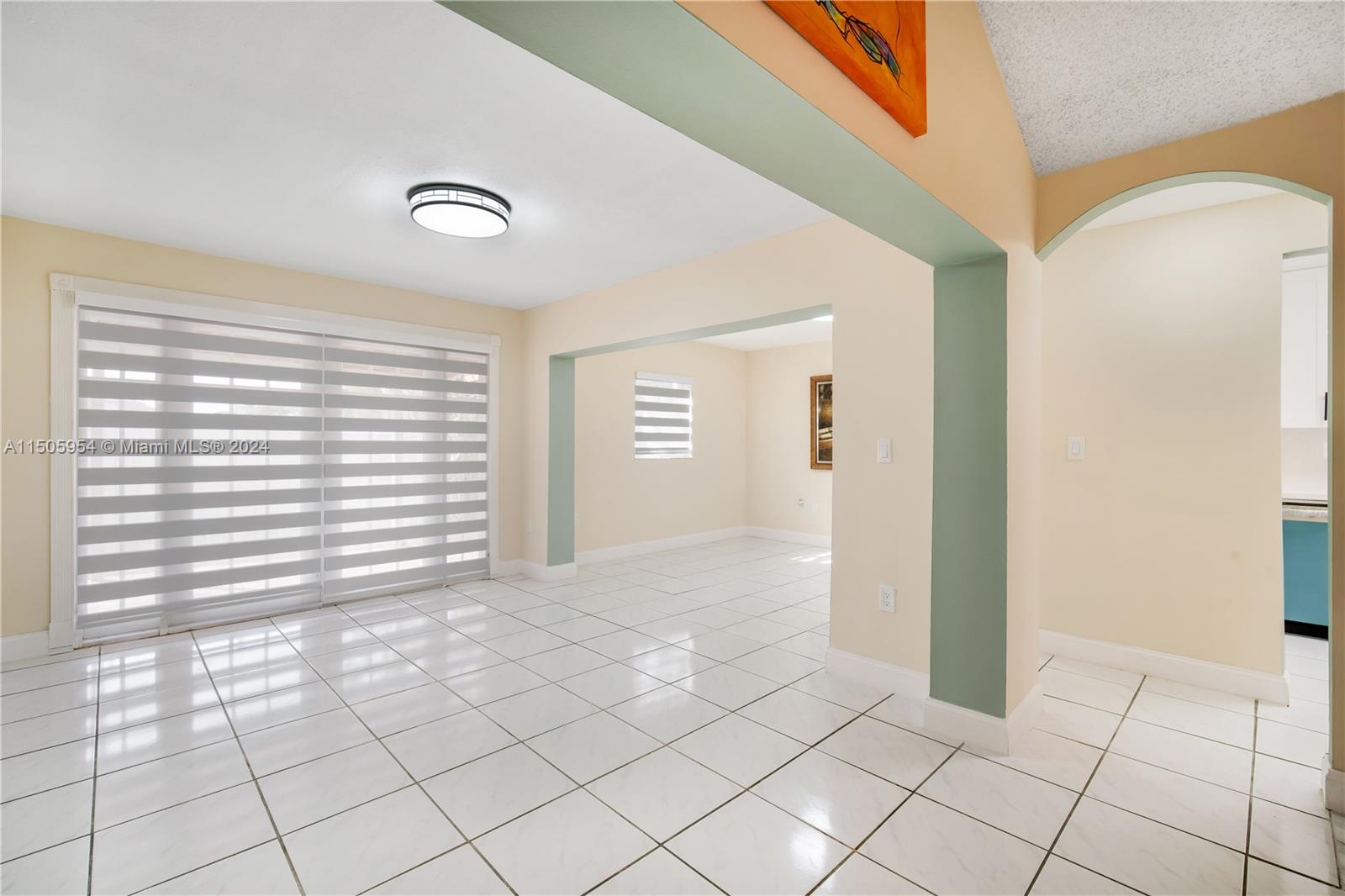 14364 Southwest 159th Terrace Miami, FL 33177 - Photo 6 of 32 a view of empty room with wooden floor