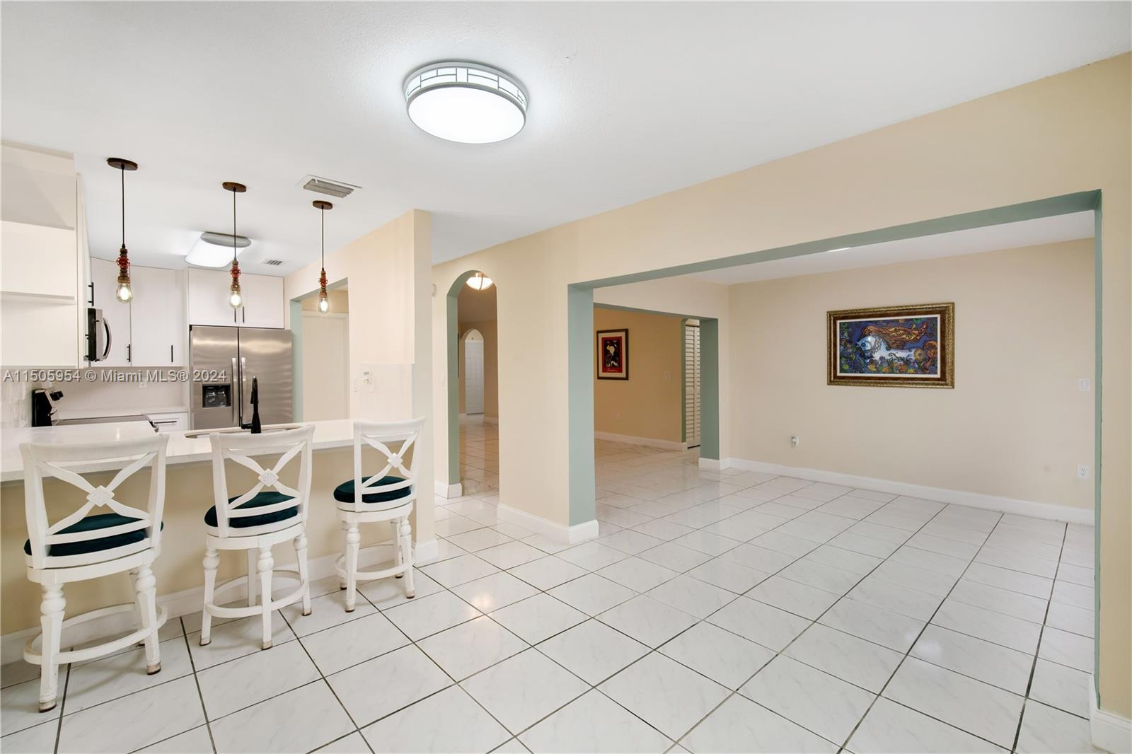 14364 Southwest 159th Terrace Miami, FL 33177 - Photo 8 of 32 a view of a kitchen with furniture and wooden floor
