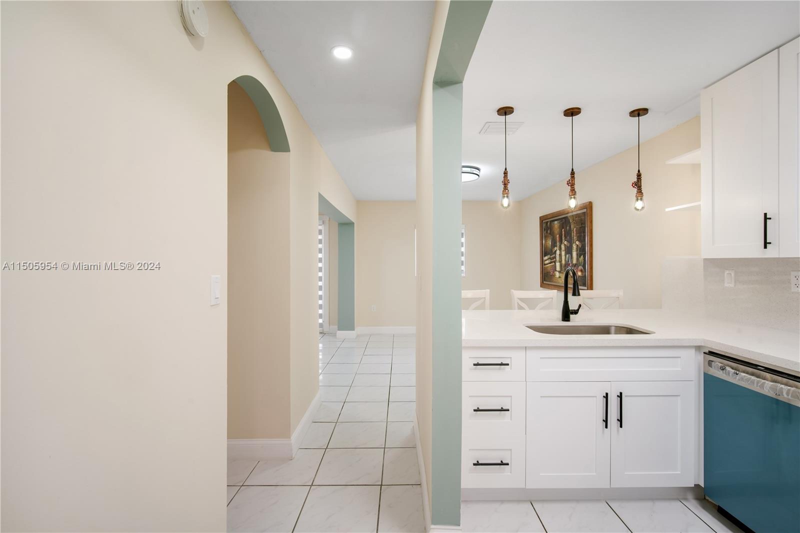 14364 Southwest 159th Terrace Miami, FL 33177 - Photo 9 of 32 a bathroom with a sink a vanity and a mirror
